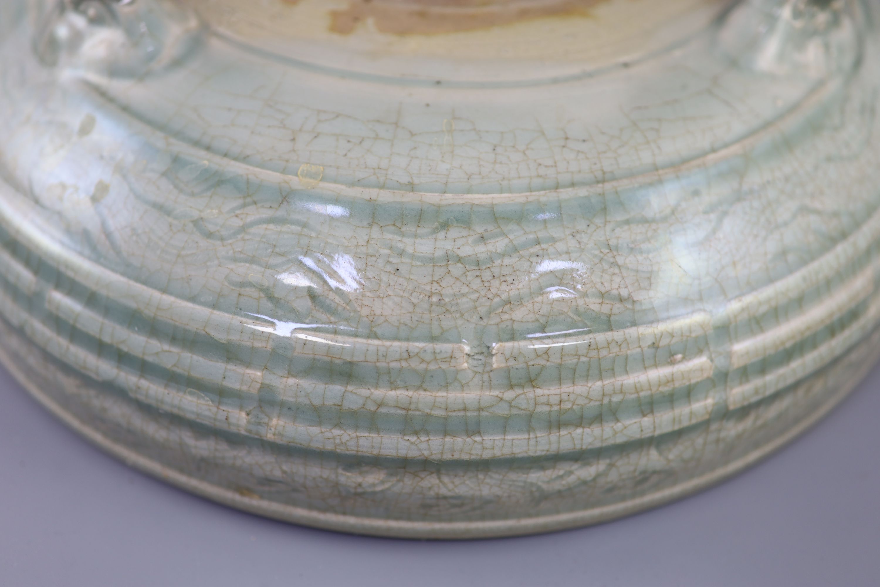 A large Chinese Longquan celadon tripod censer, Ming dynasty, 15th century, 31cm diameter